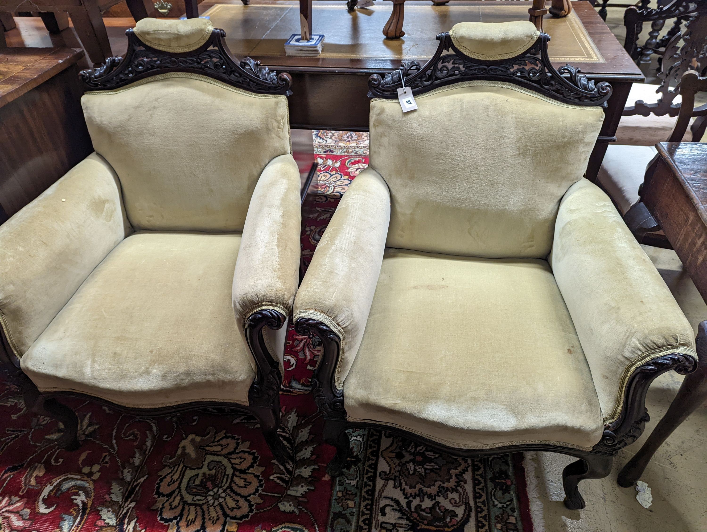 A late Victorian carved mahogany seven piece salon suite, settee length 140cm, depth 60cm, height 94cm